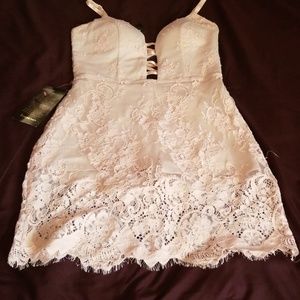 Light pink dress/romper.